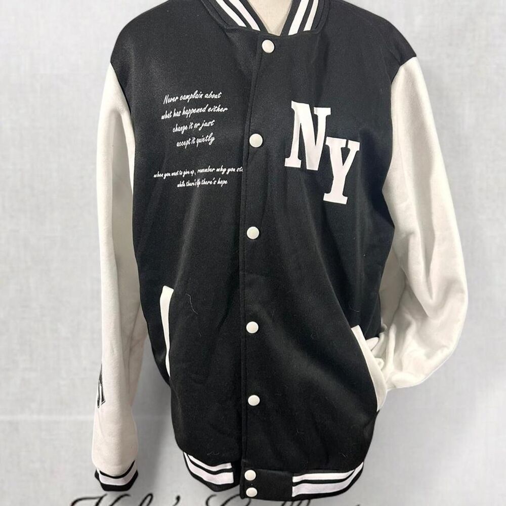 Y2K black varsity jacket with white sleeves and NY lettering